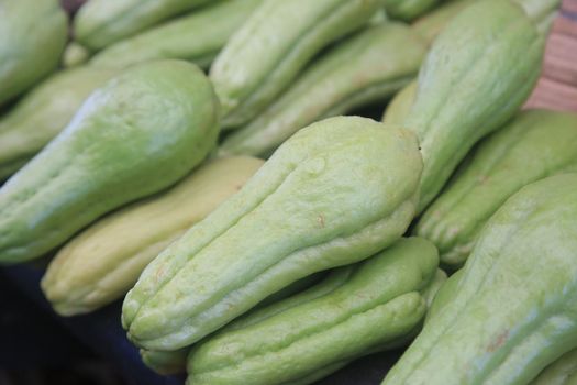 salvador, bahia, brazil - april 30, 2022: chayote for sale on display at a stall at the Sao Joaquim fair in the city of Salvador.
