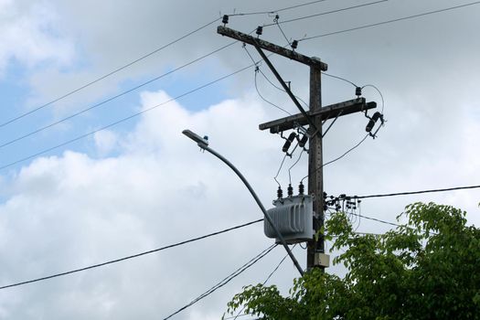 feira de santana, bahia, brazil - may 6, 2022: Electric network transformer is seen on a pole in the city of Feira de Santana.