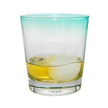 Studio photograph of a glass with an ice cube on white background