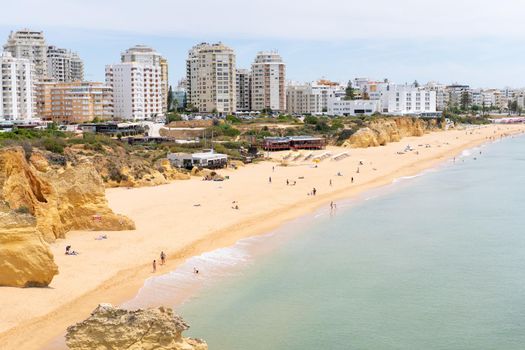 Armacao de Pera Algarve Portugal. Beautiful view on Atlantic ocean at day time and city. High quality FullHD footage