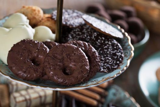 Chocolate covered tea cookies on serving tower