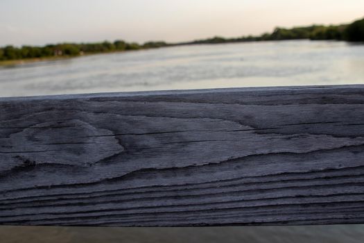 View of Platte river thru wooden Bridge rails. High quality photo