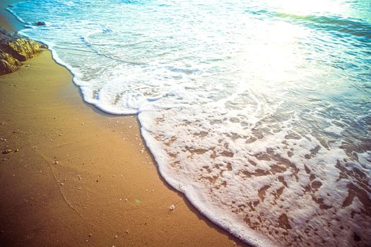 Soft Blue Waves on the beach at the summer time. sea beach blue sky sand sun daylight relaxation landscape viewpoint. The color of the water and beautifully bright clear water.