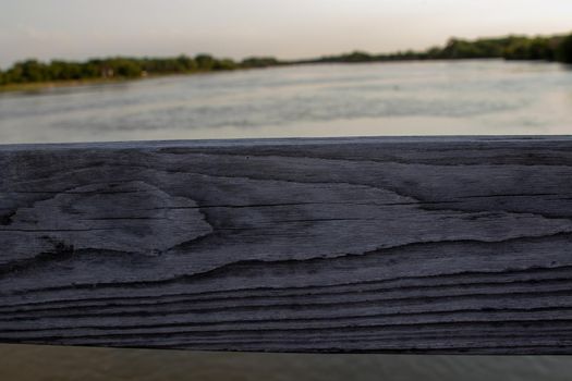 View of Platte river thru wooden Bridge rails. High quality photo