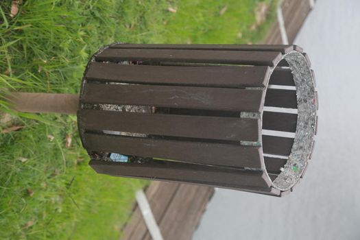 salvador, bahia, brazil - dezembro 2, 2021: Wooden litter bin is seen in park in Salvador city.