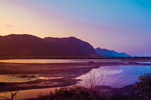Panorama Sam Roi Yot mountain ranges layer landscape at sunset Thailand.