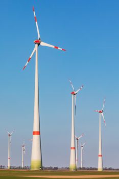 Several wind turbines dominate the landscape in Germany