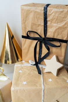 Christmas, gifts, Christmas tree, decorations. The concept of preparing for the holiday, buying and wrapping gifts