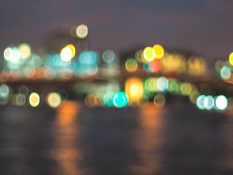 Bokeh city lights background. Bokeh of cityscape skyline during evening dark blue sunset, dusk twilight