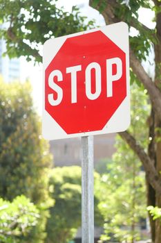 Stop sign in a empty road ,