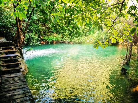 Huay Mae Khamin waterfall in Kanchanaburi, Thailand South east asia Jungle landscape with amazing turquoise water of cascade waterfall at deep tropical rain forest. travel landscape and destinations