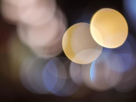 Colorful blur light hexagon bokeh background. Abstract Christmas festival defocused background.