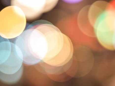Colorful blur light hexagon bokeh background. Abstract Christmas festival defocused background.