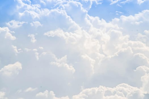 Beautiful white fluffys clouds sky background with blue sky background for copyspace