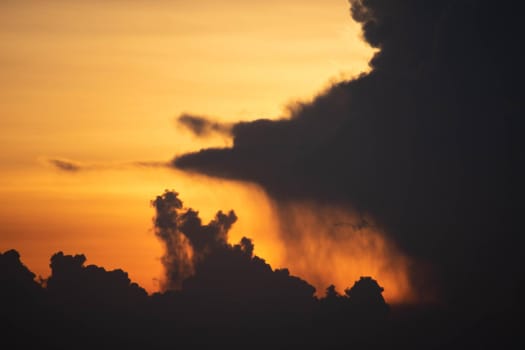 Giant dark cloud. Storm Clouds at Sunset before rain abstract weather environment season.