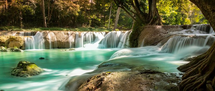 Panoramic exotic  beautiful tropical deep rainforest waterfall  and lake panorama landscape