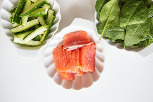 Preparation of all ingredients for cooking sushi seafood, vegetables, rice, nori, sticks