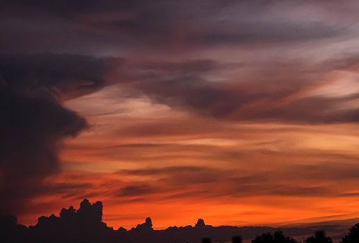 Giant dark cloud. Storm Clouds at Sunset abstract weather season.