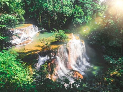 Huay Mae Khamin waterfall in Kanchanaburi, Thailand South east asia Jungle landscape with amazing turquoise water of cascade waterfall at deep tropical rain forest. travel landscape and destinations