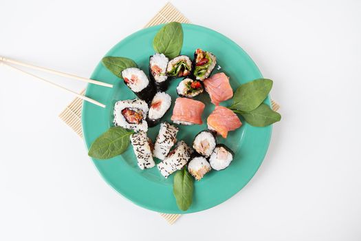 Various types of maki sushi, philadelphia, maki, salmon, rice, salad Delicious and healthy food