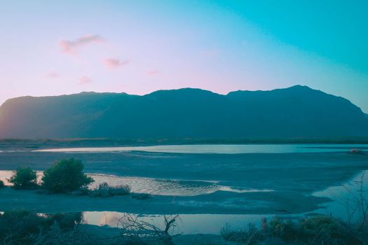 Panorama Sam Roi Yot mountain ranges layer landscape at sunset Thailand.