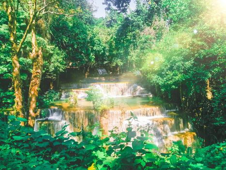 Huay Mae Khamin waterfall in Kanchanaburi, Thailand South east asia Jungle landscape with amazing turquoise water of cascade waterfall at deep tropical rain forest. travel landscape and destinations