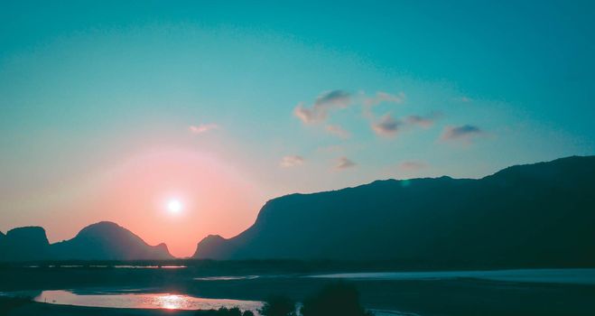 Panorama Sam Roi Yot mountain ranges layer landscape at sunset Thailand.
