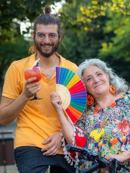 senior mom with adult son in family concept , happy and together outdoors in nature