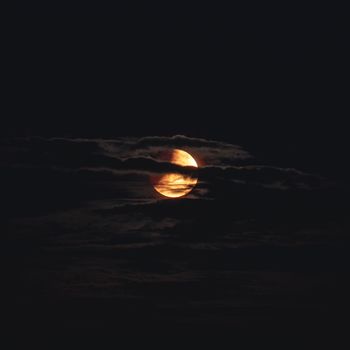 Full moon with clouds, in The Netherlands