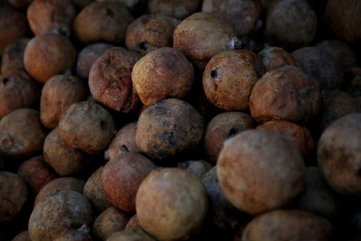 salvador, bahia, brazil - june 28, 2021: Genipapo fruit for sale at Feira de Sao Joaquim in the city of Salvador.
