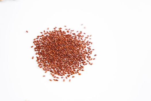 Flat lay microgreen seeds on white background.