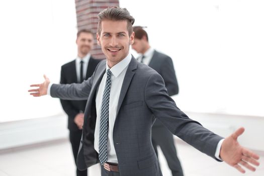 handsome businessman with open hands