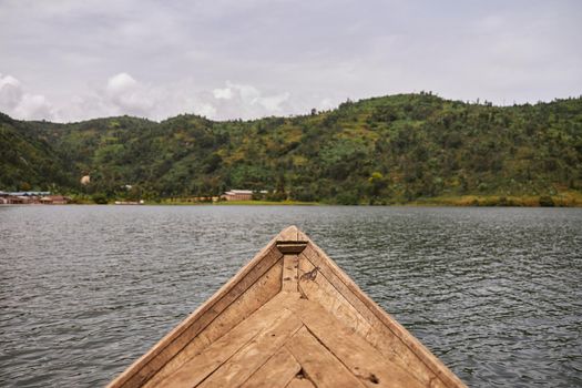 Cropped photo of boat river trip in Africa with forest view