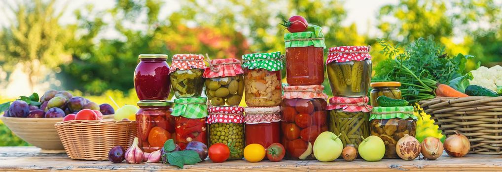 Jars with preserved vegetables for the winter. Selective focus. Food.