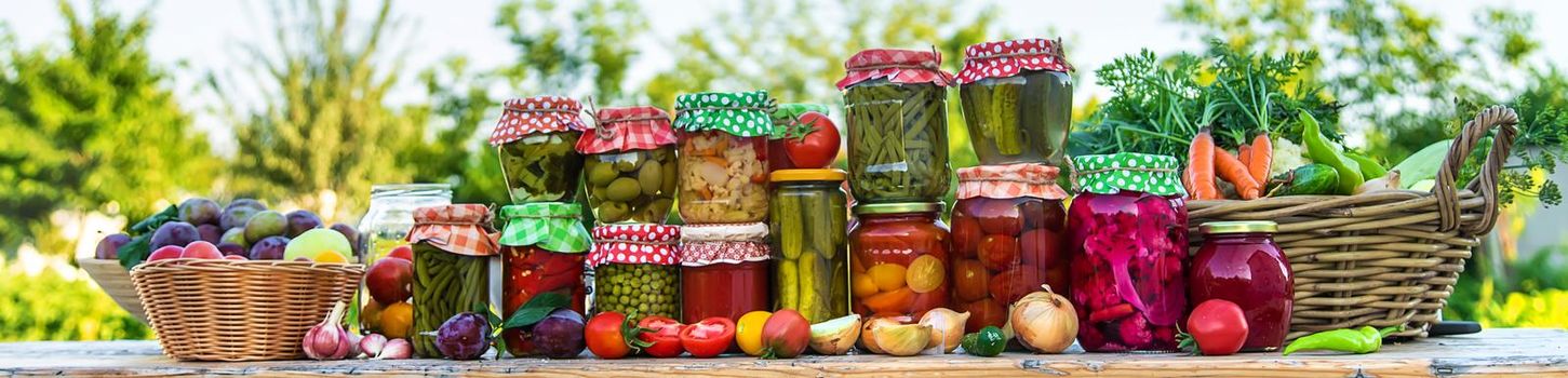 Jars with preserved vegetables for the winter. Selective focus. Food.