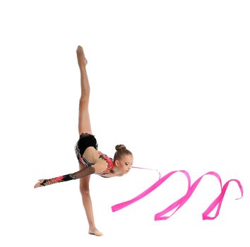 Beautiful teenager girl doing gymnastics split with ribbon