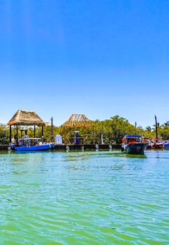 Holbox Mexico 16. May 2022 Panorama landscape view on beautiful Holbox island with boats Holbox ferry jetty village port harbor Muelle de Holbox and turquoise water in Quintana Roo Mexico.