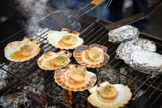 Grilled scallops with herbs and potatoes