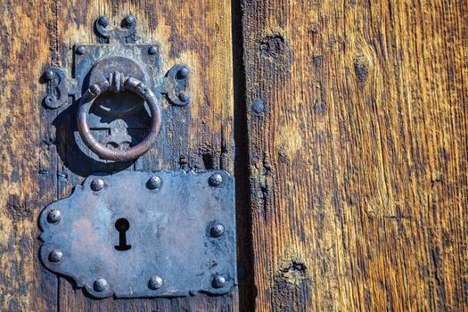 Ancient Lom Stave Church door lock closed, Norway, Scandinavia