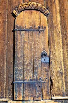Ancient Lom Stave Church door lock closed, Norway, Scandinavia