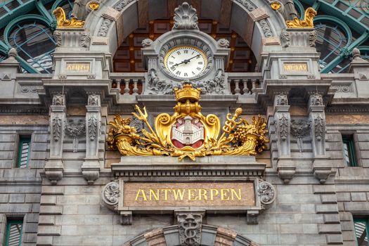 Ornate Antwerp Central Train Station indoors with clock, Belgium