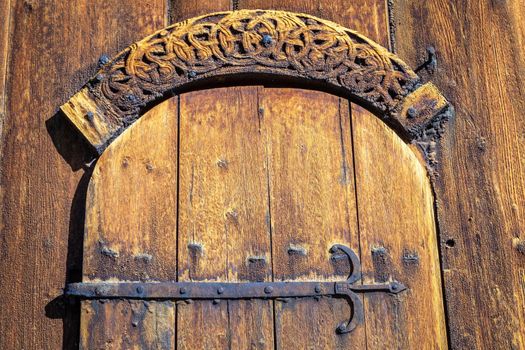 Ancient Lom Stave Church door lock closed, Norway, Scandinavia
