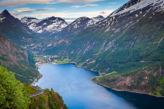Geiranger fjord village in More og Romsdal at dramatic sky, Norway, Northern Europe