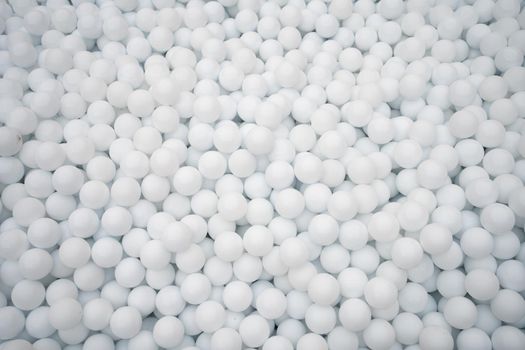 Many white plastic balls for dry pool in amusement park