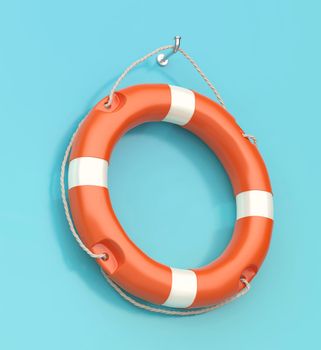 Orange lifebuoy ring hanged on a wall