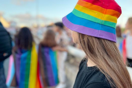 Seattle Pride Parade. Child wearing rainbow colors to support the Pride parade.