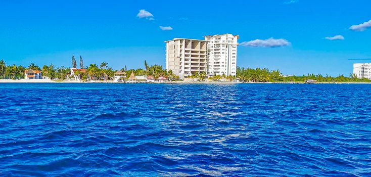 Beautiful Playa Azul beach and seascape panorama with blue turquoise water hotels resorts and palm trees in Cancun Quintana Roo Mexico.