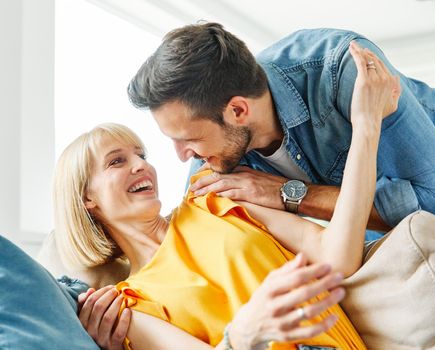 Portrait of a lovely young couple together at home