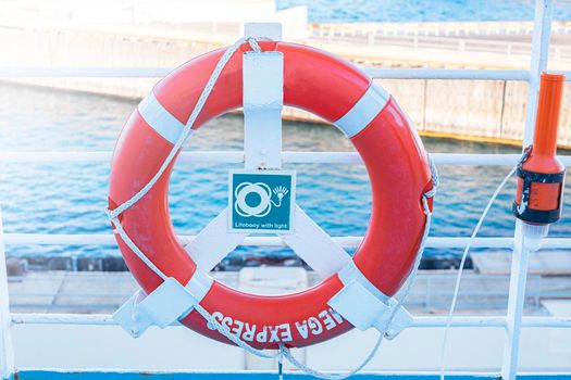 Lifebuoy on the deck of cruise ship, boat