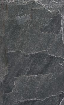 Gray granite wall close-up. grey concrete wall.